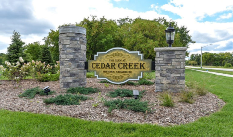 Monument sign for our Cedar Creek. One of our gorgeous condominium communities .
